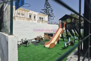 Charmant Appart Balnéaire, Une résidence Fermée avec pisc… – Immohajir Immobilier au Maroc | Appartement Location saisonnière à Sidi Rahal (photo 20)