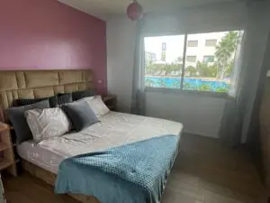 À louer Bel appart balnéaire accès direct à la plage – Immohajir Immobilier au Maroc | Appartement Location saisonnière à Sidi Rahal (photo 2)