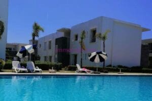 Appartement Moderne à louer Dar El bahr piscine et plage – Immohajir Immobilier au Maroc | Appartement Location saisonnière à Sidi Yaaqoub (photo 1)